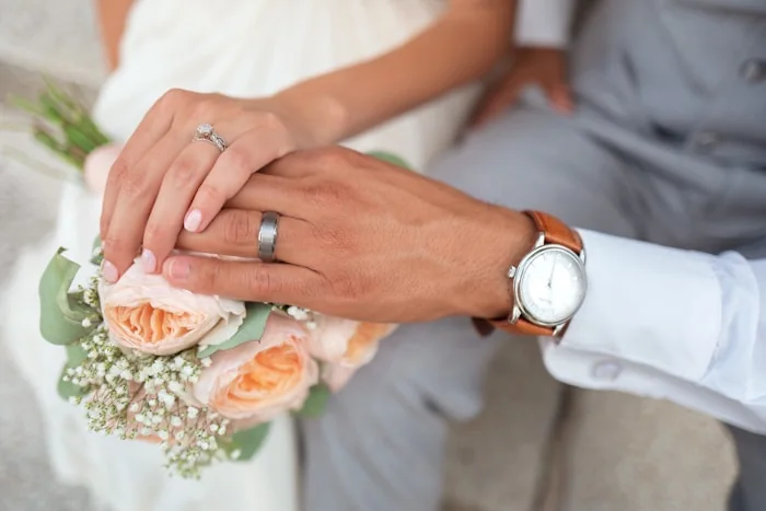 Detalhe das alianças de casamento — André Lima